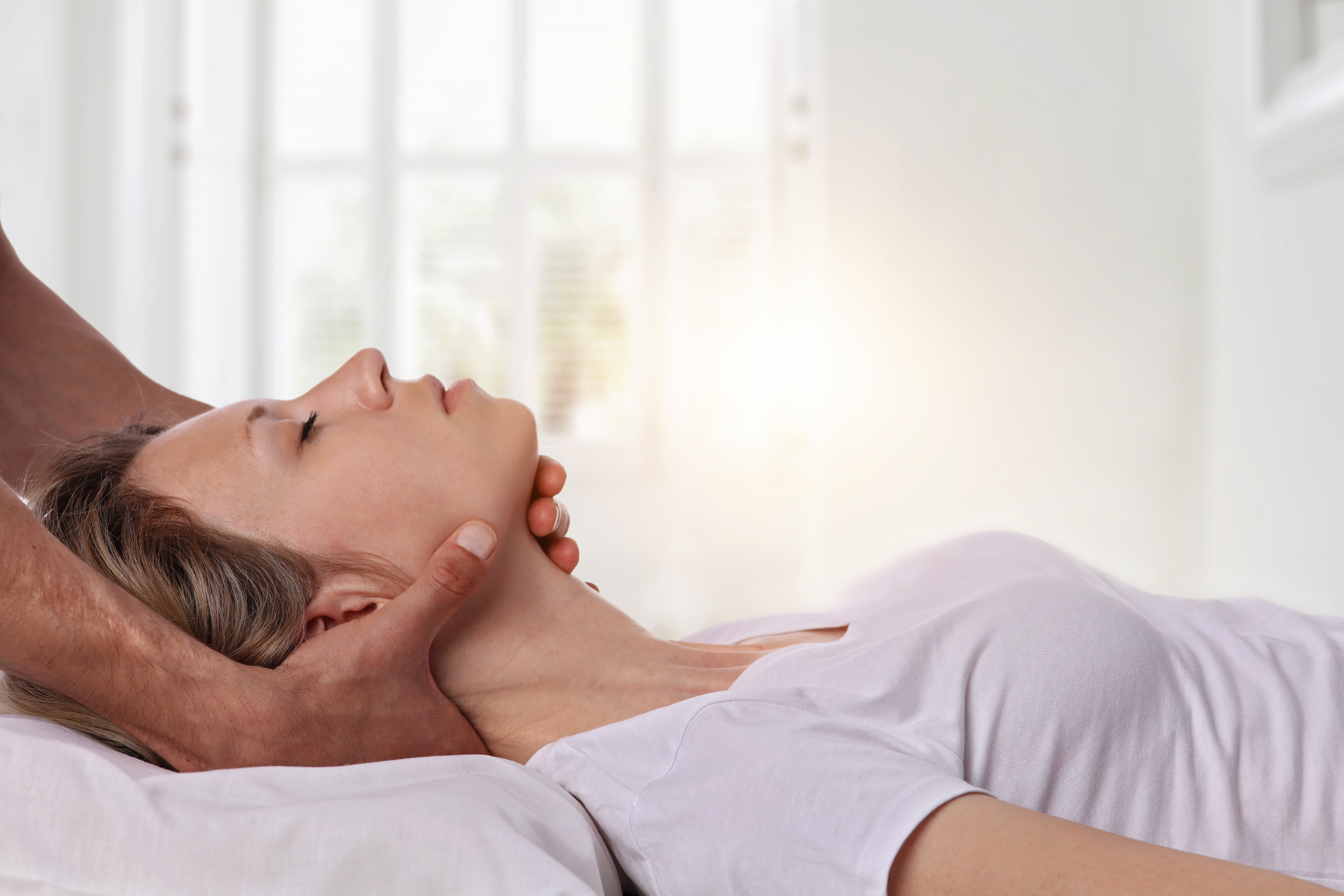 Woman getting chiropractic wellness care
